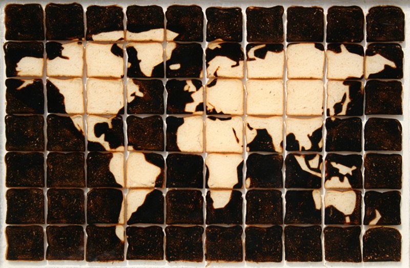 Mappamundi - L'Art et la Cartographie : avid Reimondo_PATCH WORLD INVERSO, 2007_Pain et résine, 80 x 125 cm © David Reimondo, Galerie Di Meo, 2010.jpg